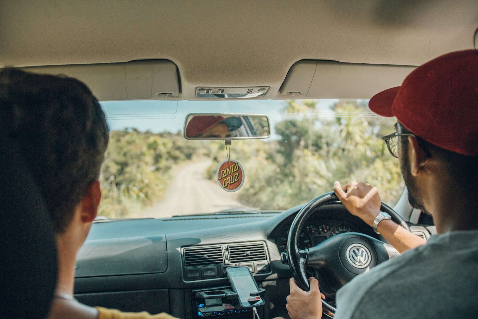 Two friends driving together